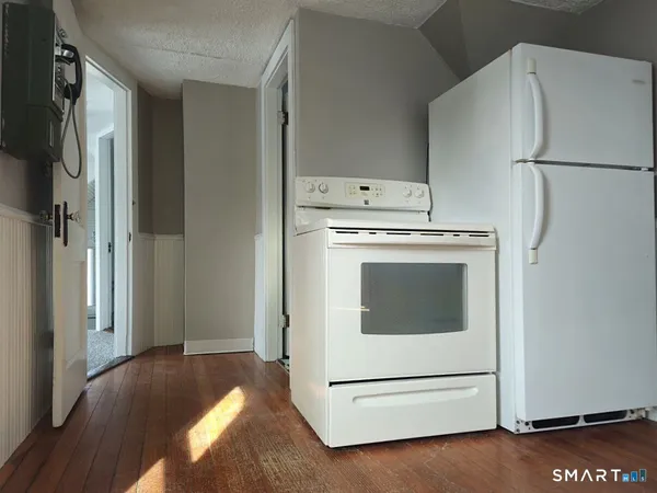 a utility room with washer and dryer