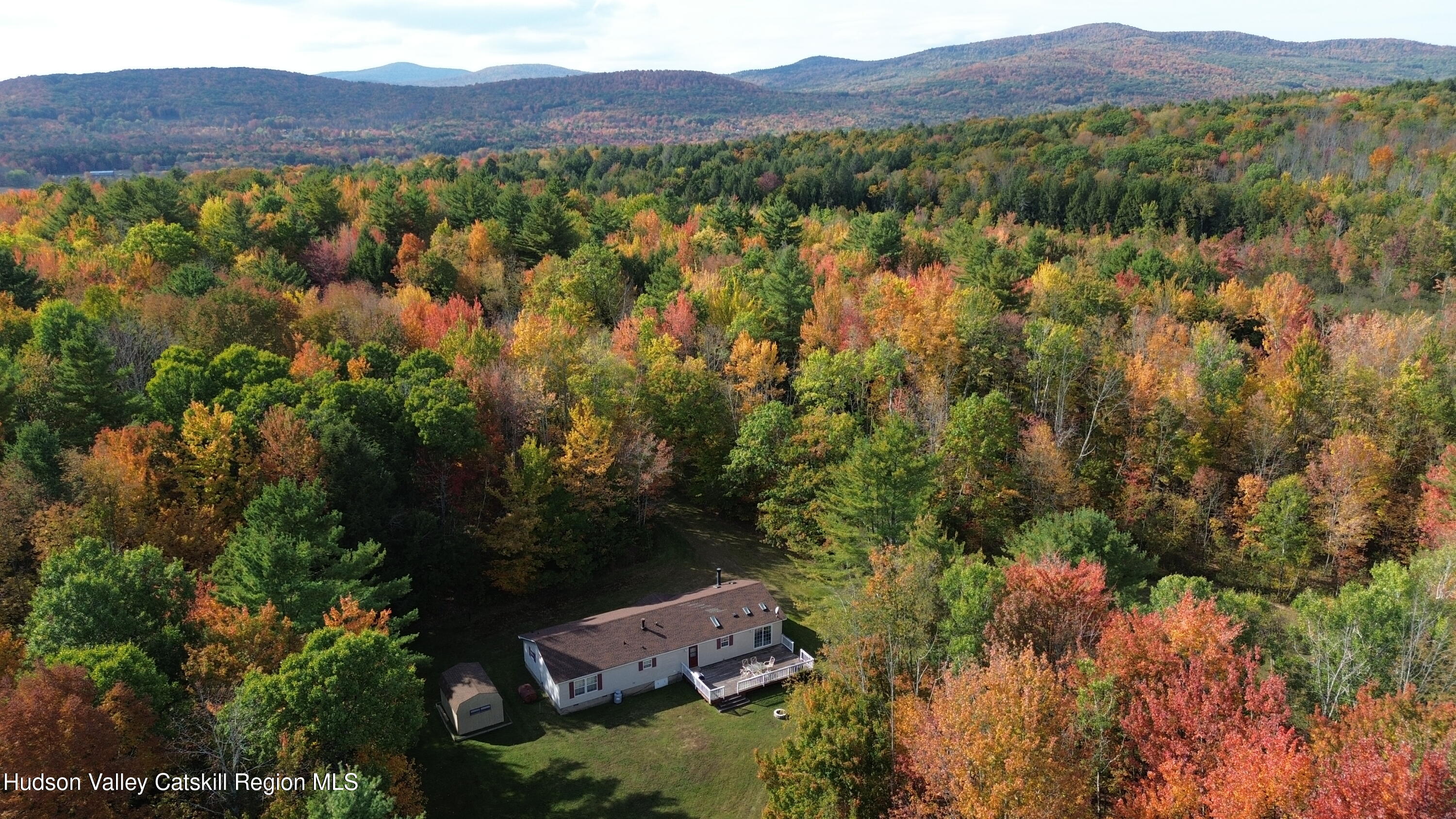 an aerial view of residential house with outdoor space