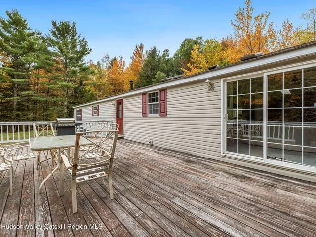 a kitchen with stainless steel appliances a refrigerator and a stove top oven