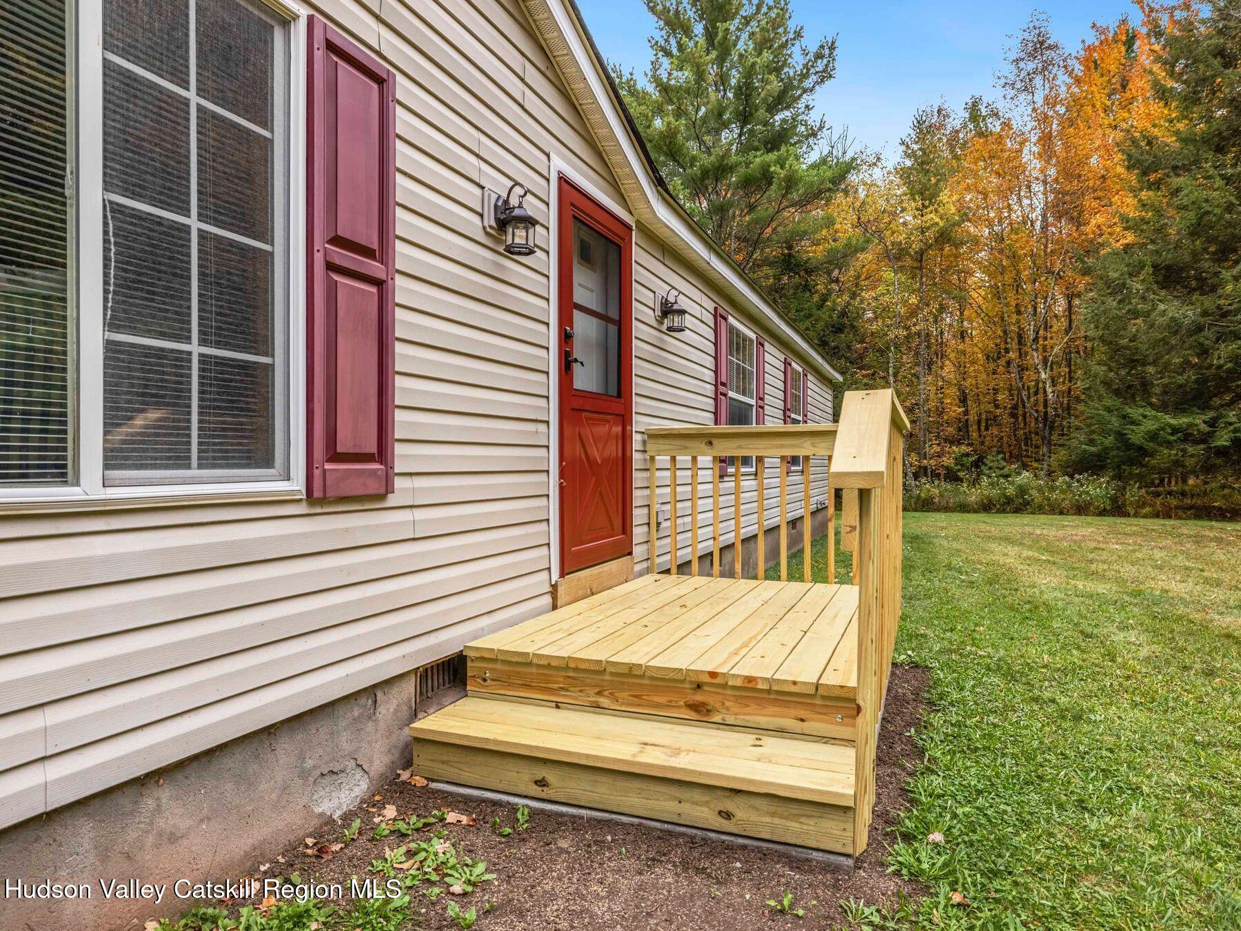 370 Begley Road Windham, NY 12496 - Photo 42 of 51 a view of backyard with deck and outdoor seating