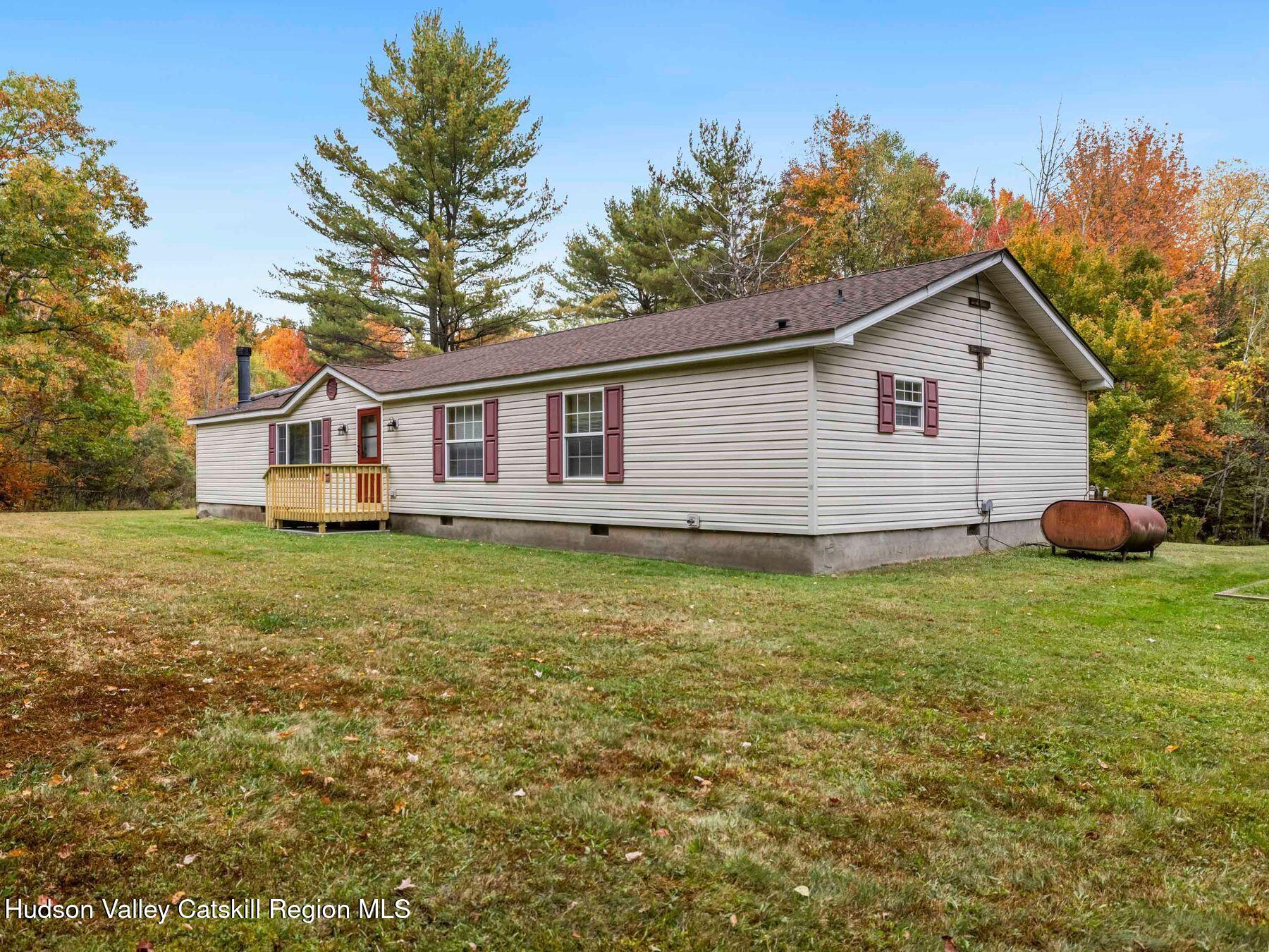 370 Begley Road Windham, NY 12496 - Photo 43 of 51 a bathroom with a sink and garden
