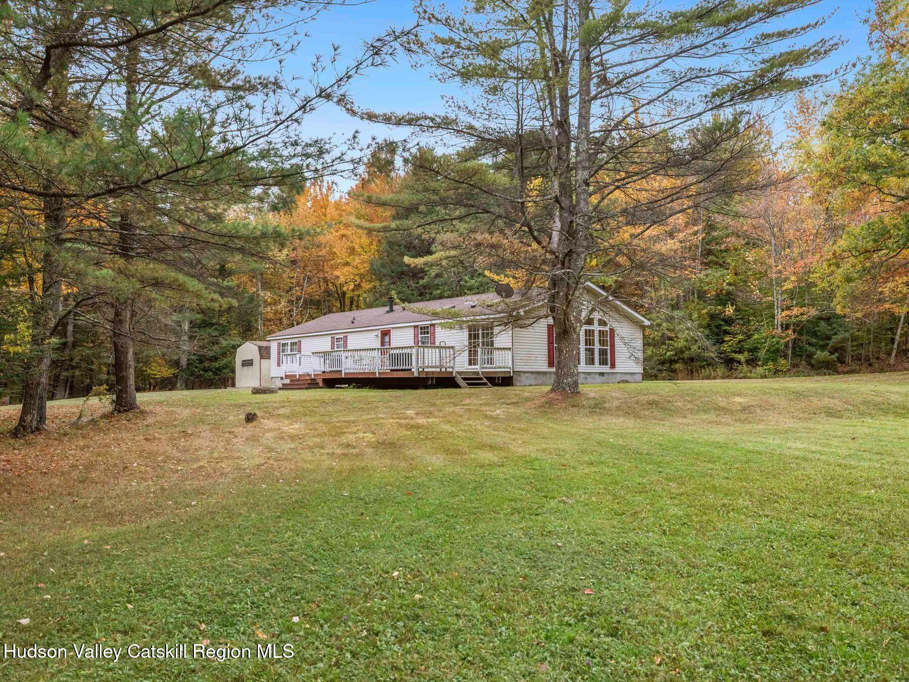 370 Begley Road Windham, NY 12496 - Photo 6 of 51 a front view of a house with a yard