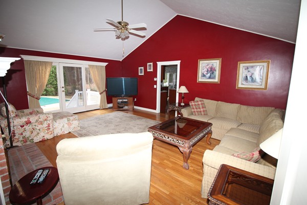 4 Lyn Path Hopkinton, MA 01748 - Photo 11 of 28 a living room with furniture a window and flat screen tv