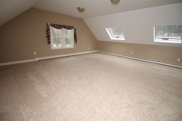 4 Lyn Path Hopkinton, MA 01748 - Photo 14 of 28 an empty room with windows and closet