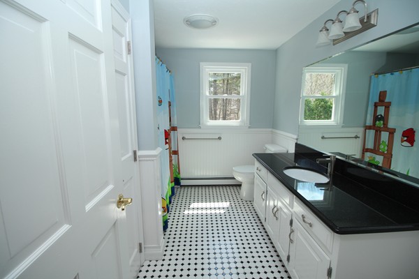 4 Lyn Path Hopkinton, MA 01748 - Photo 16 of 28 a kitchen with a sink a refrigerator and window