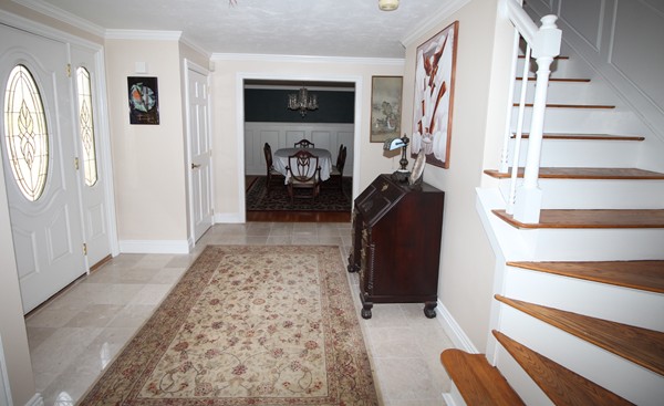 4 Lyn Path Hopkinton, MA 01748 - Photo 4 of 28 a view of walk in closet with clothes and shoes