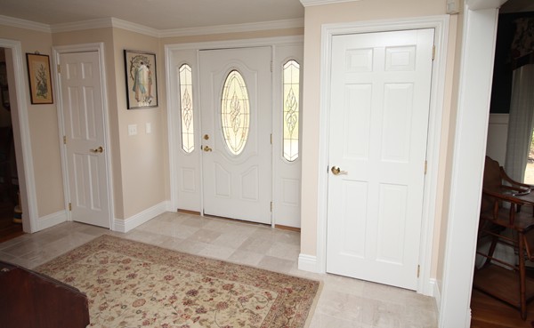 4 Lyn Path Hopkinton, MA 01748 - Photo 5 of 28 an entryway with a rug