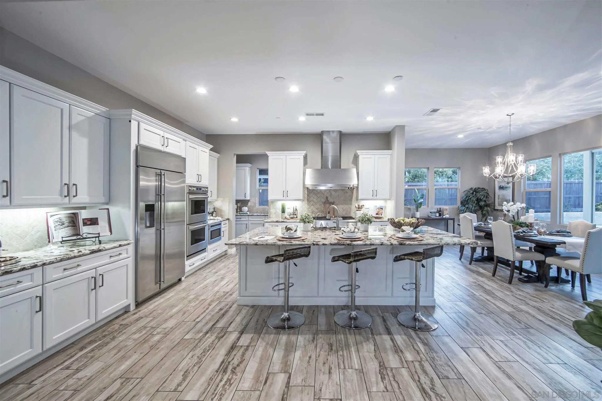 545 Ledge Street San Marcos, CA 92078 - Photo 11 of 55 a kitchen with lots of counter top space and stainless steel appliances