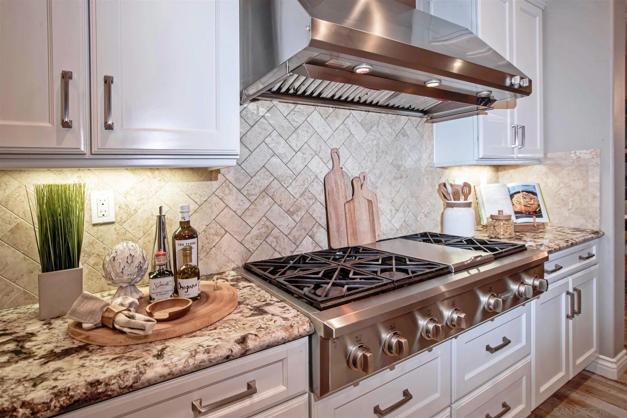 545 Ledge Street San Marcos, CA 92078 - Photo 16 of 55 a kitchen with granite countertop stainless steel appliances and cabinets