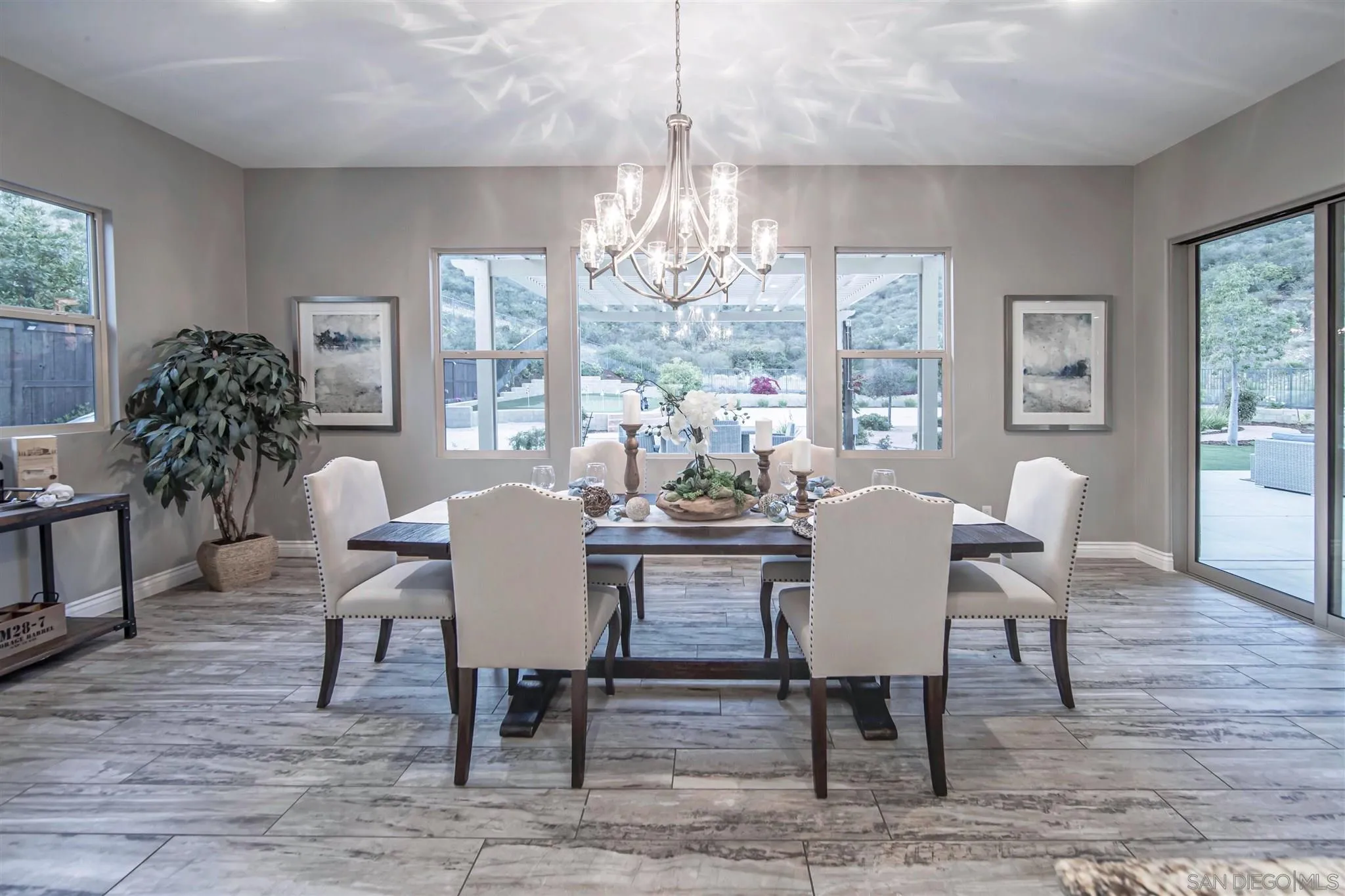 545 Ledge Street San Marcos, CA 92078 - Photo 22 of 55 a view of a dining room with furniture window and wooden floor