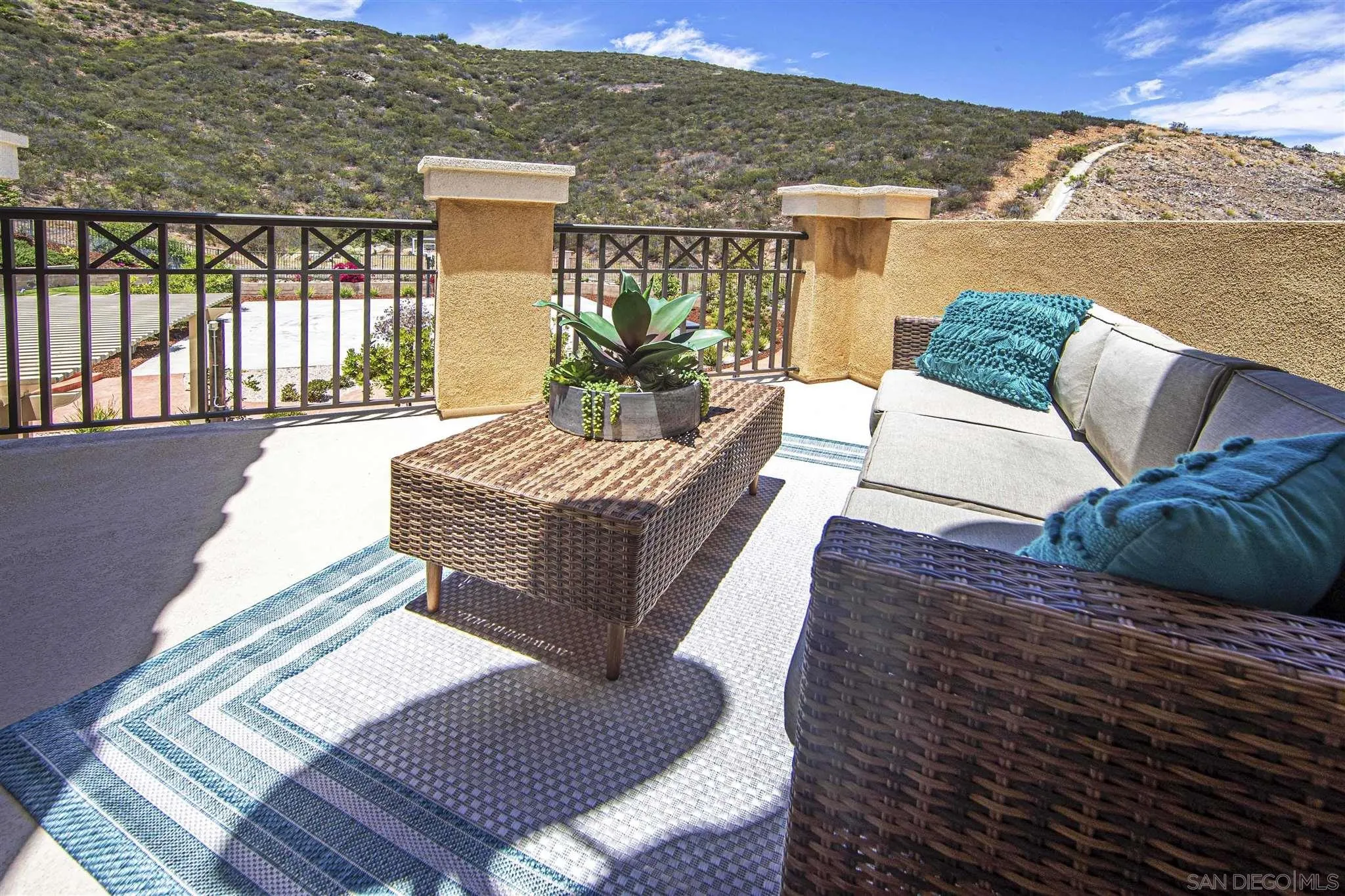 545 Ledge Street San Marcos, CA 92078 - Photo 26 of 55 a living room with furniture and a table