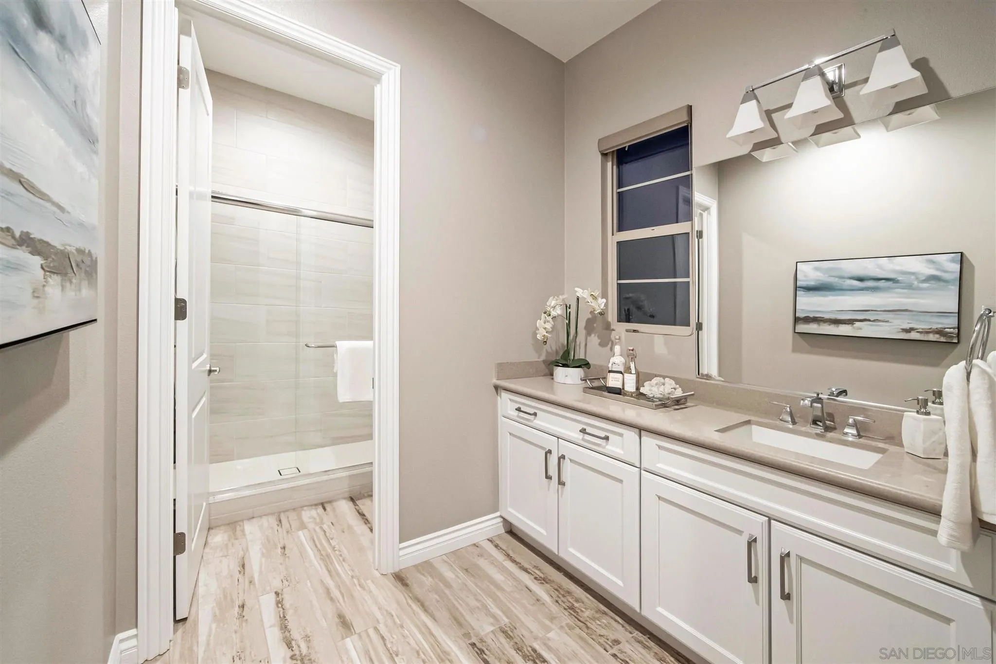 545 Ledge Street San Marcos, CA 92078 - Photo 39 of 55 a bathroom with a double vanity sink and mirror