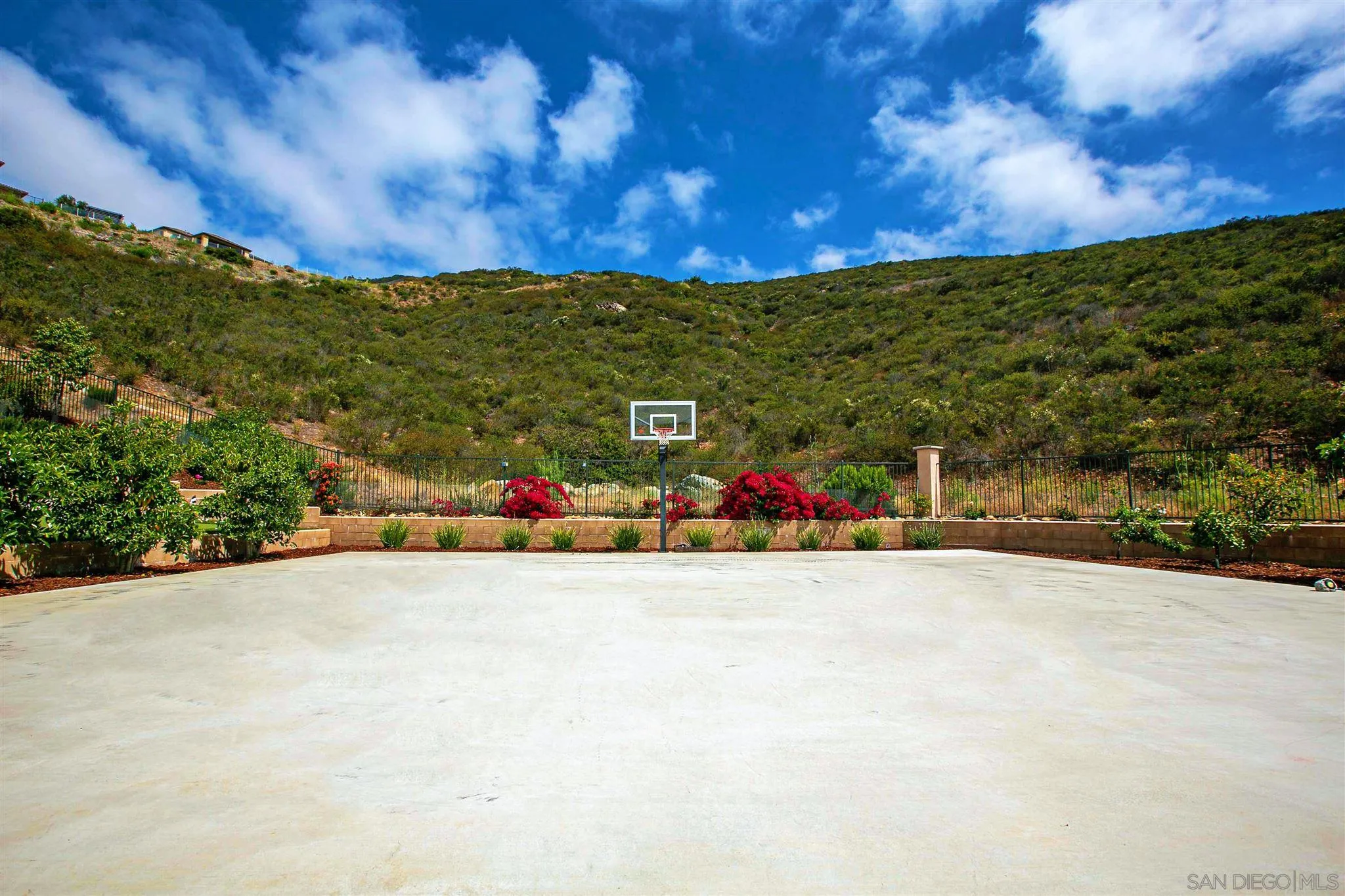 545 Ledge Street San Marcos, CA 92078 - Photo 42 of 55 a view of a road with a building in the background