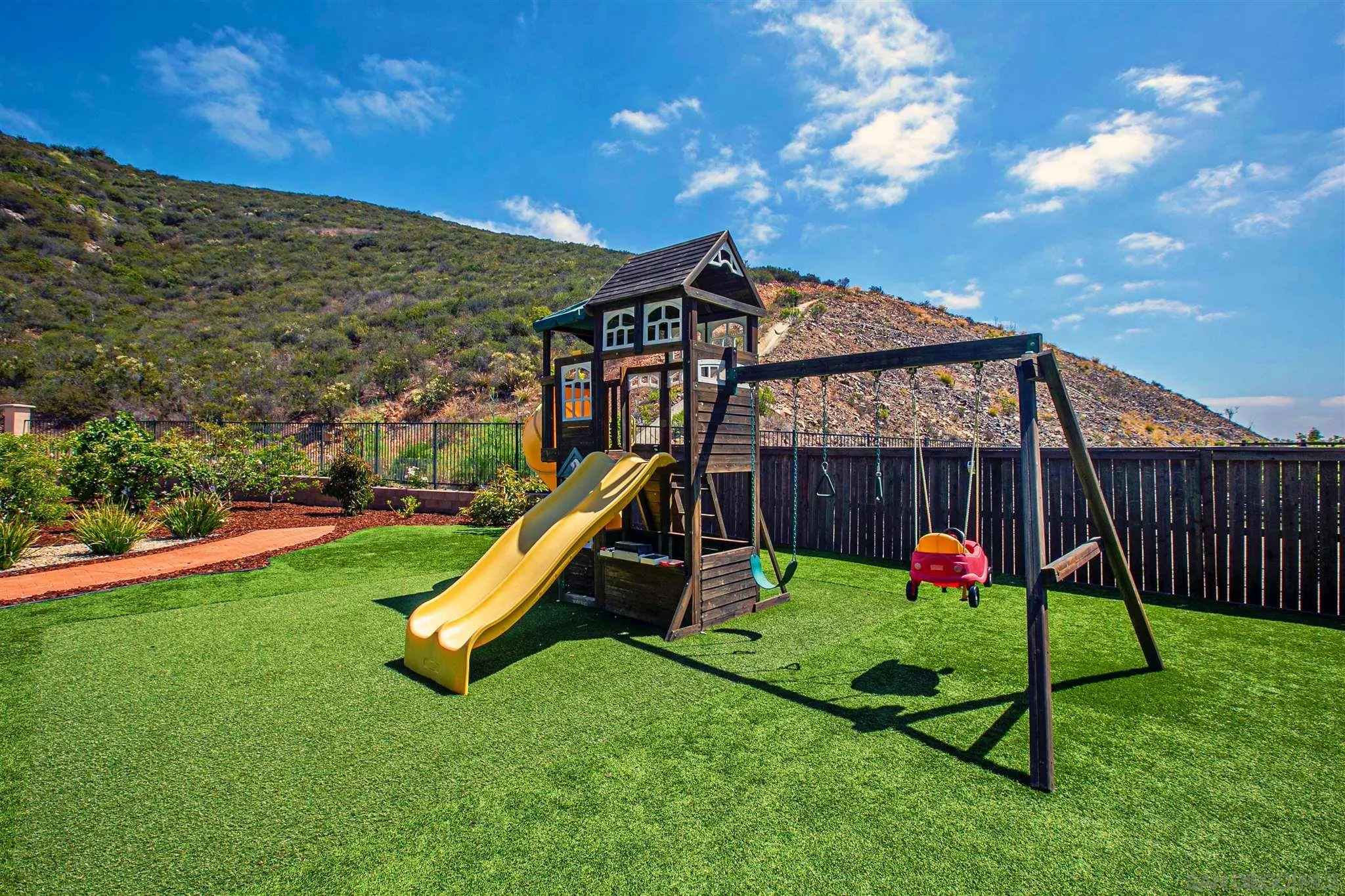 545 Ledge Street San Marcos, CA 92078 - Photo 46 of 55 a view of a house with backyard