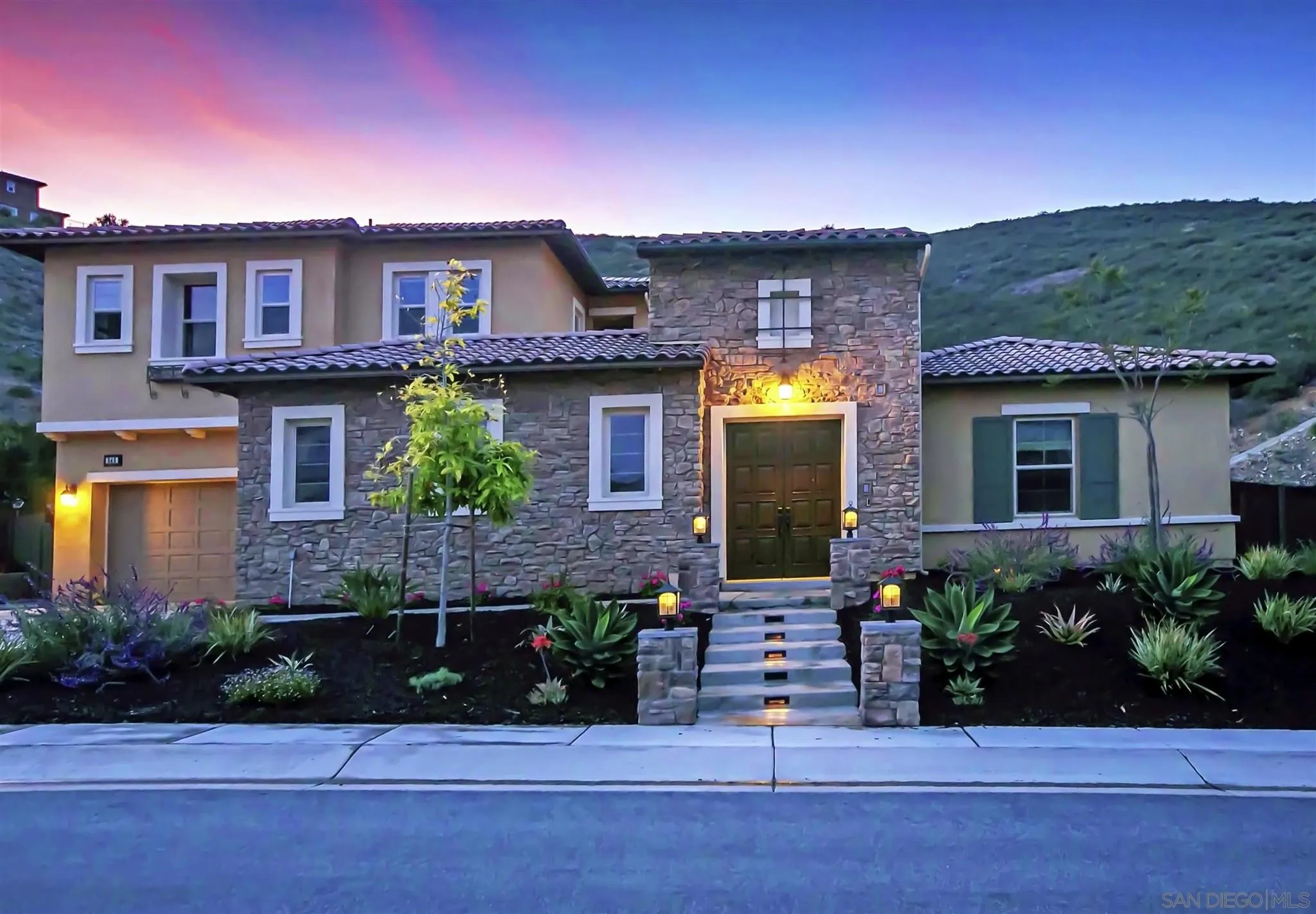 545 Ledge Street San Marcos, CA 92078 - Photo 51 of 55 a front view of a house with a garden
