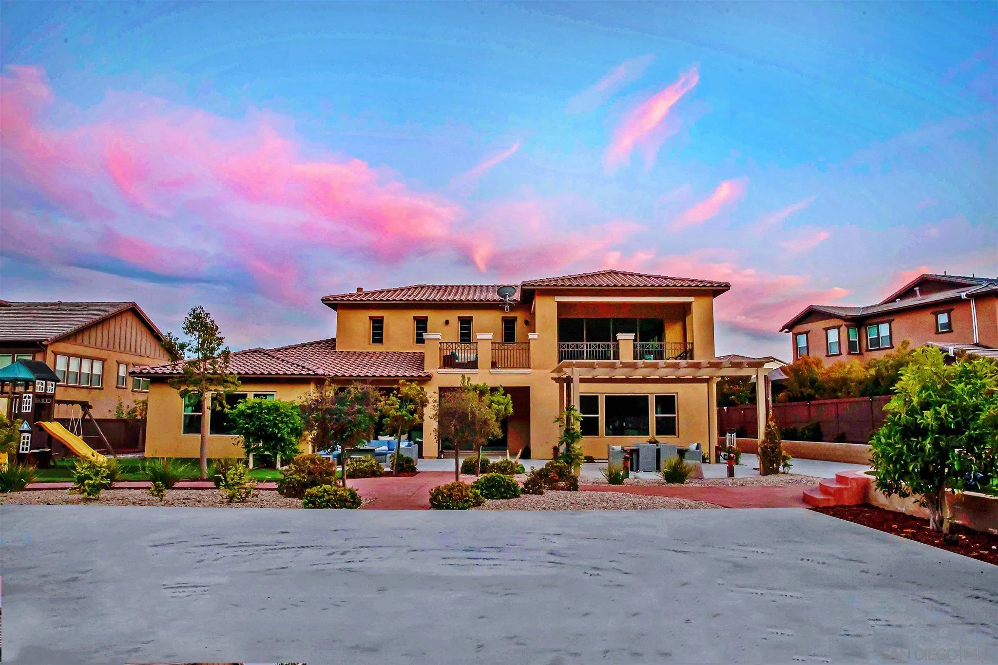 545 Ledge Street San Marcos, CA 92078 - Photo 52 of 55 a front view of a house with sitting area and garden