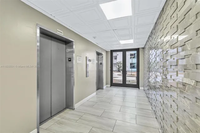 a view of entryway with a front door