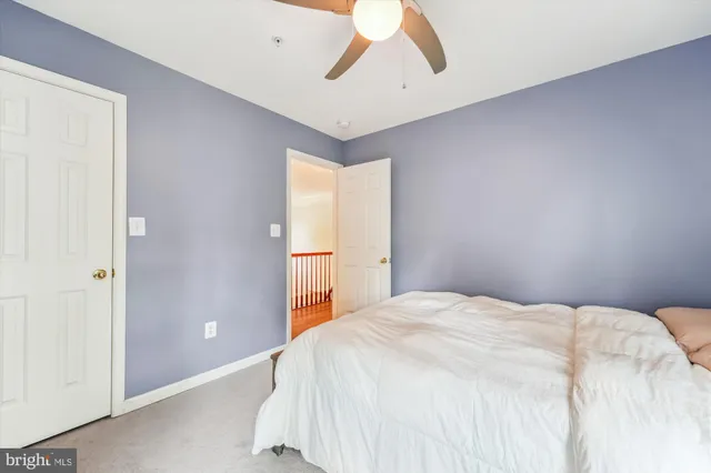 a view of a house with backyard and wooden floor
