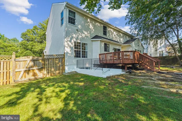 a front view of a building with parking