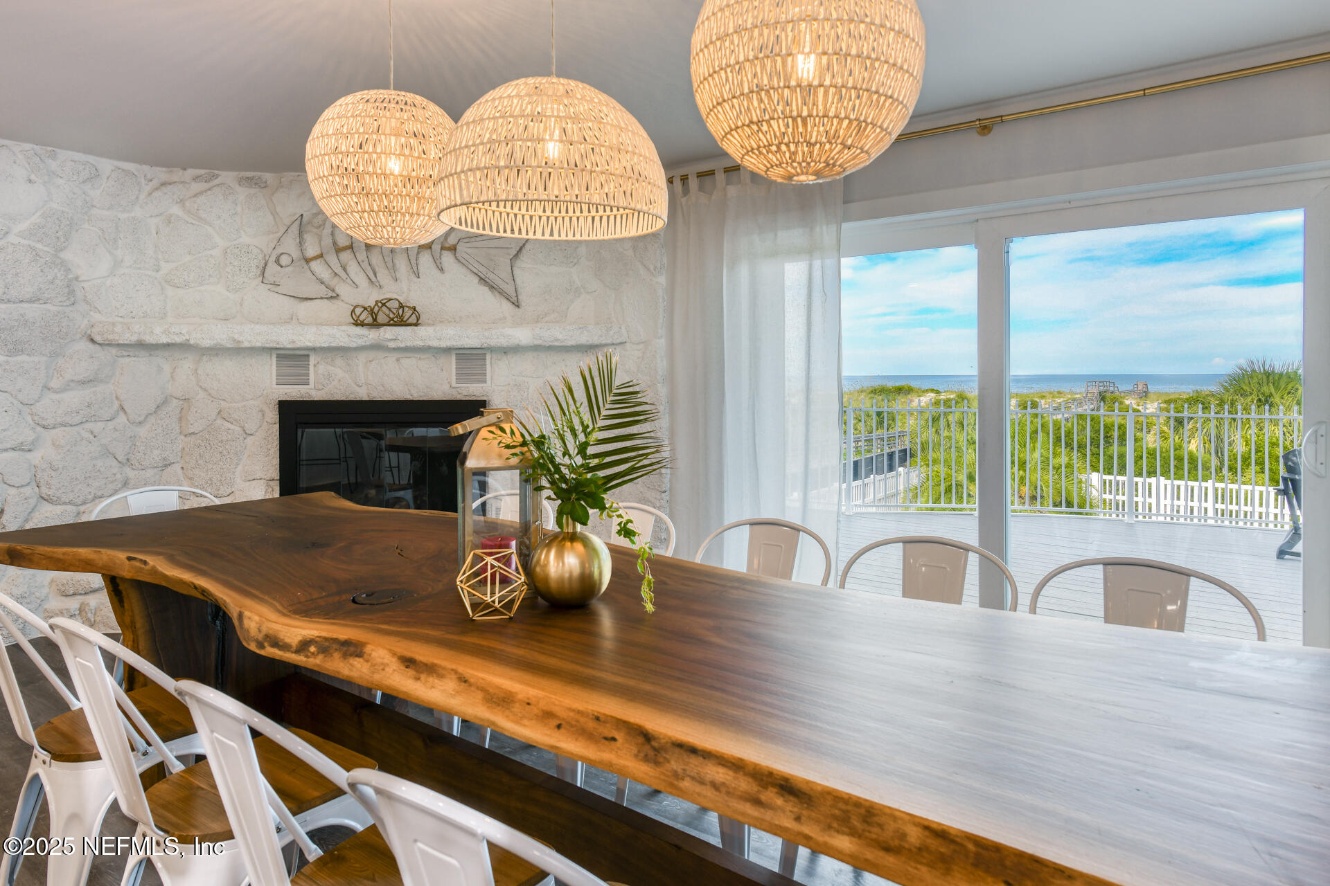 5072 Atlantic View St. Augustine, FL 32080 - Photo 11 of 68 a kitchen with a sink a counter and a fireplace
