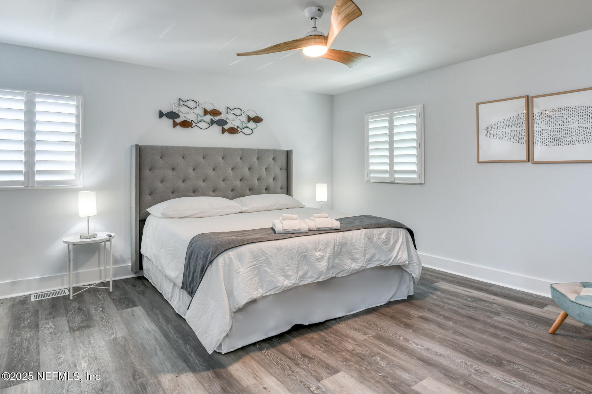 5072 Atlantic View St. Augustine, FL 32080 - Photo 18 of 68 a bedroom with a bed and a chandelier