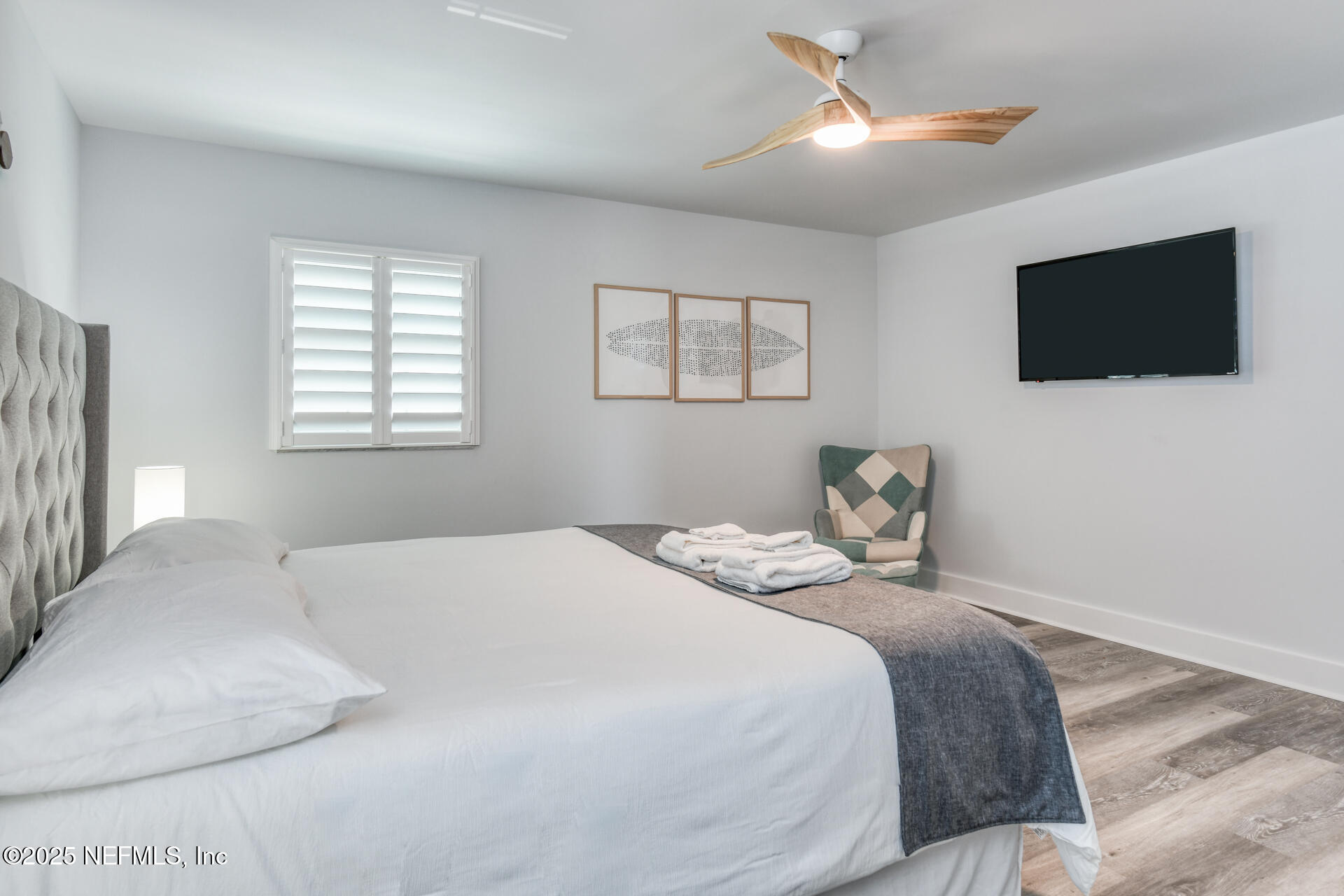 5072 Atlantic View St. Augustine, FL 32080 - Photo 19 of 68 a bedroom with a bed and a flat screen tv