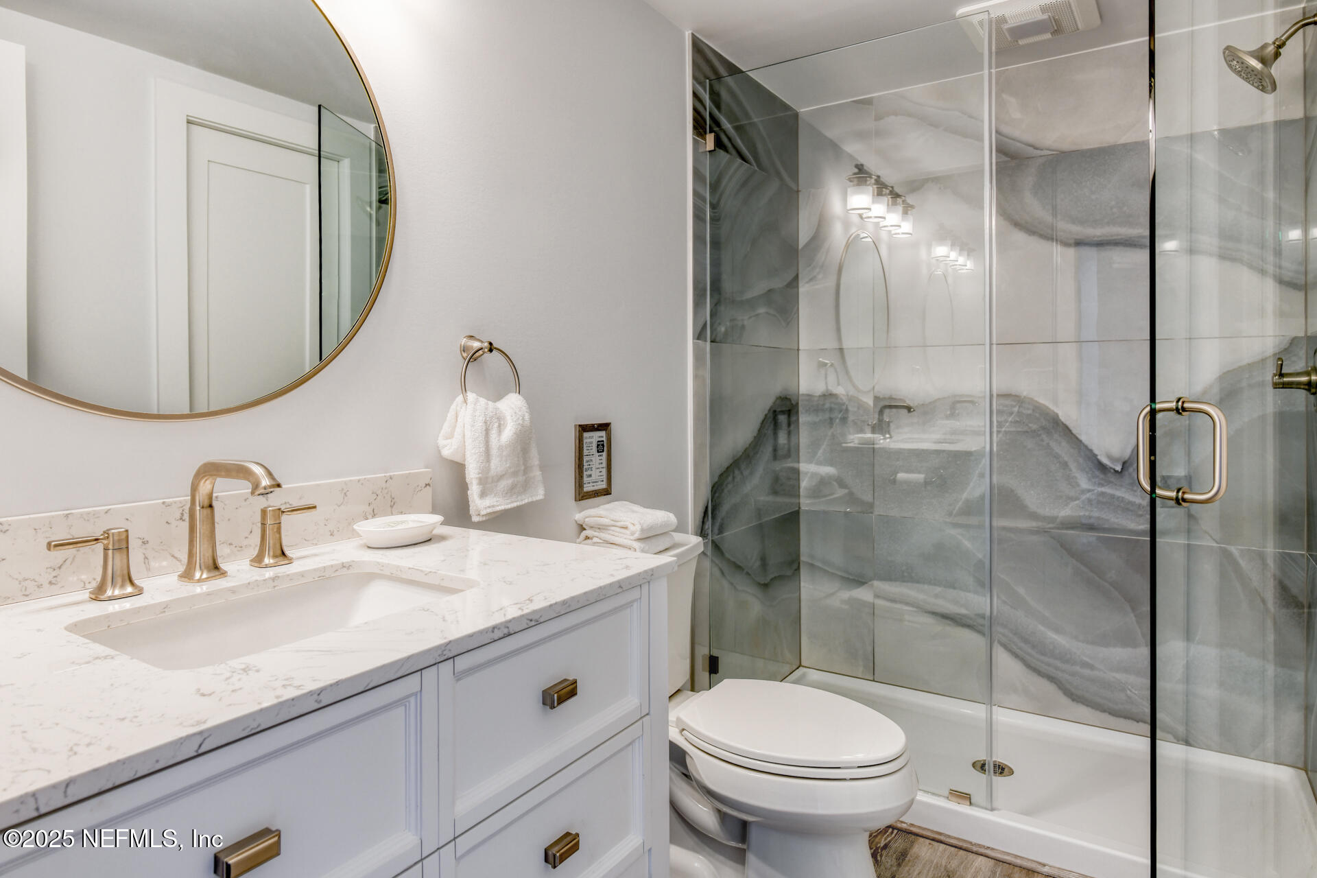 5072 Atlantic View St. Augustine, FL 32080 - Photo 20 of 68 a bathroom with a sink toilet and shower