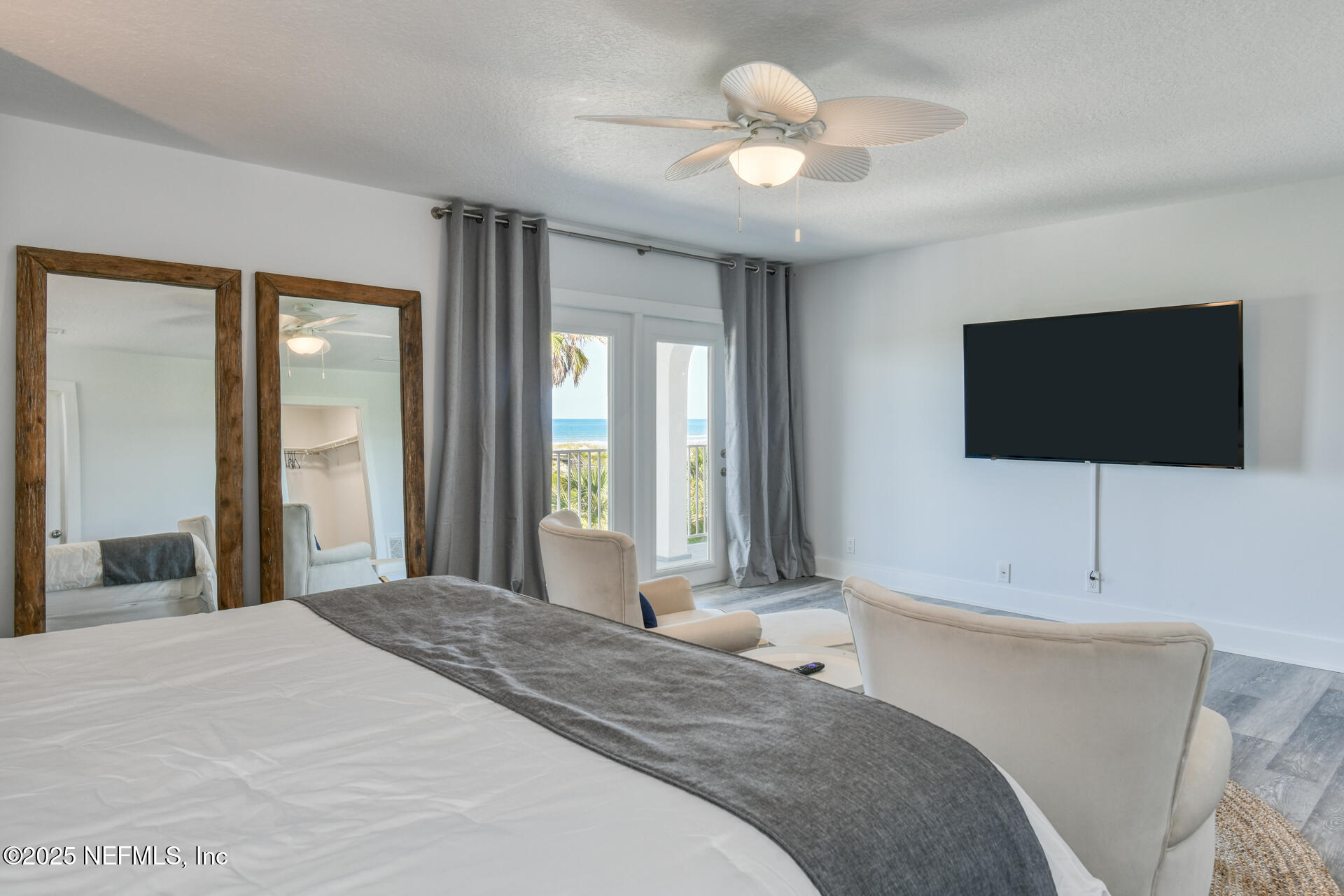 5072 Atlantic View St. Augustine, FL 32080 - Photo 24 of 68 a bedroom with a bed and a flat screen tv