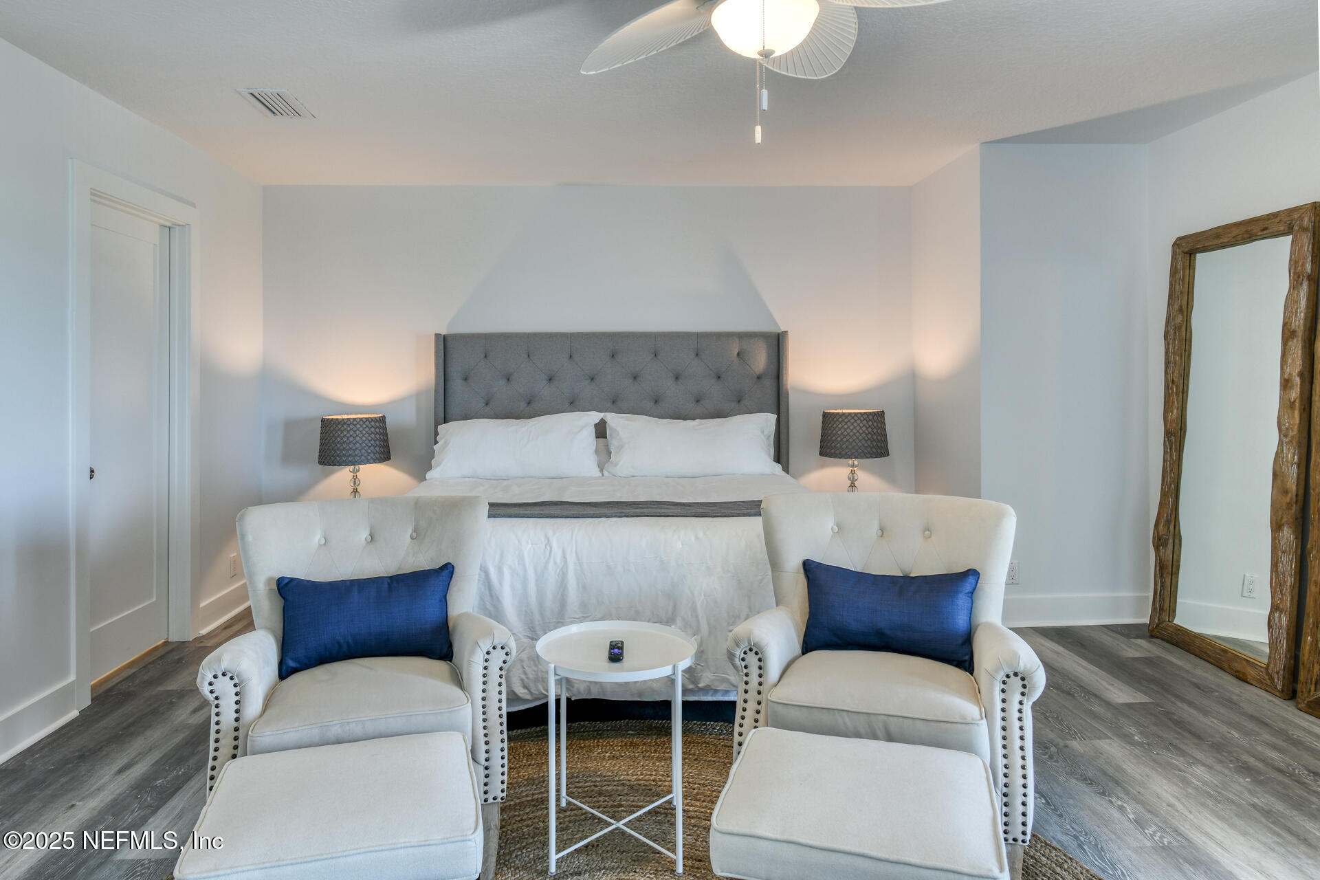 5072 Atlantic View St. Augustine, FL 32080 - Photo 25 of 68 a living room with furniture and a lamp