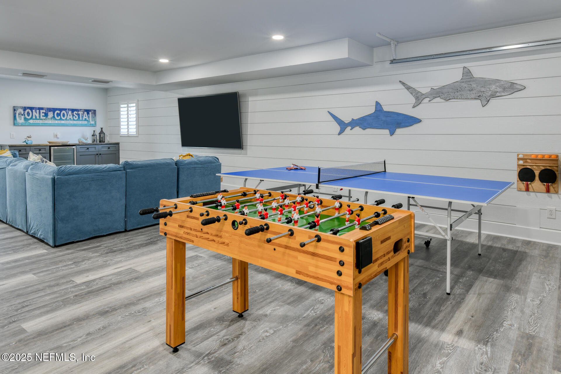 5072 Atlantic View St. Augustine, FL 32080 - Photo 43 of 68 a living room with furniture and a flat screen tv