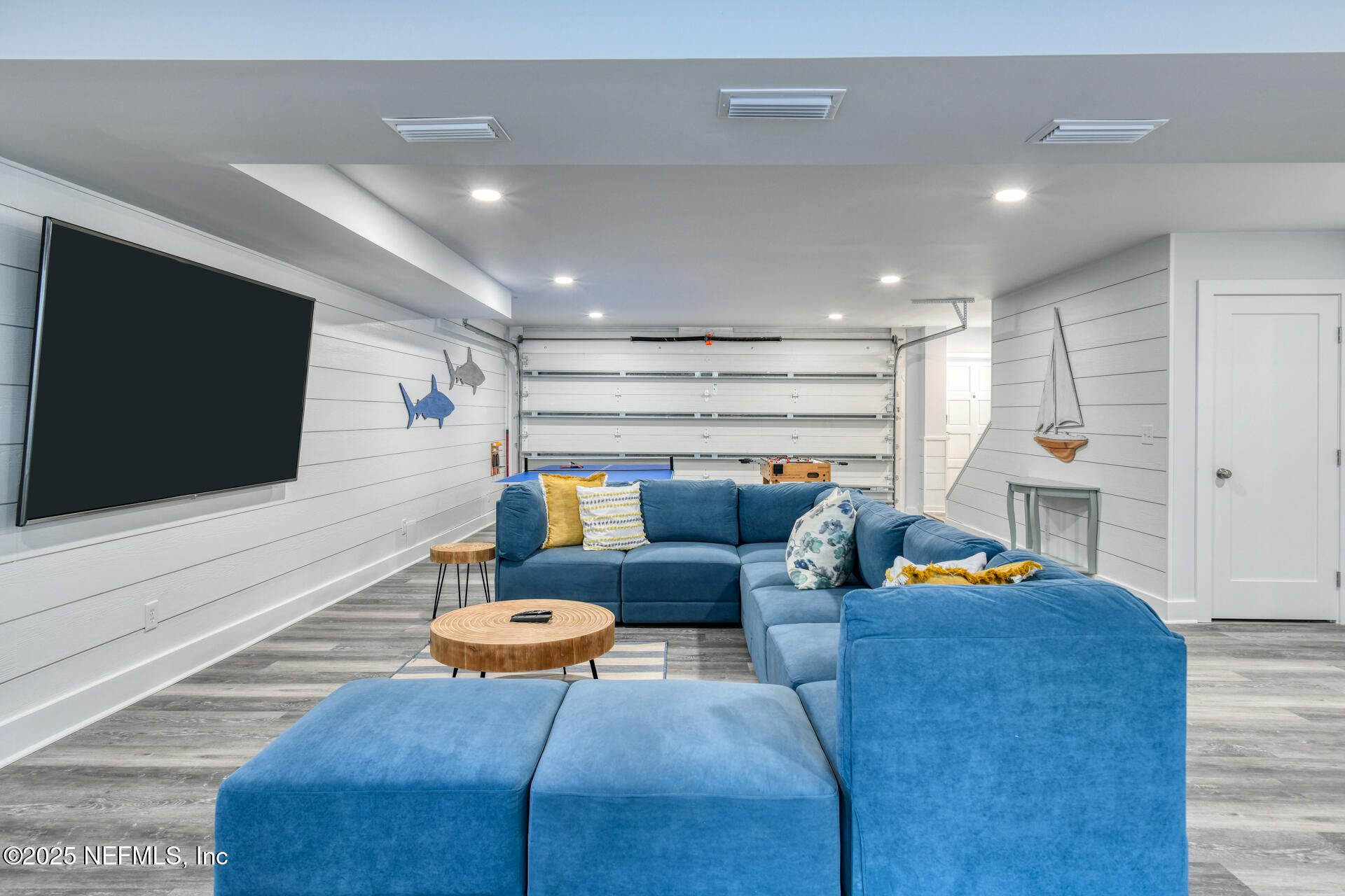 5072 Atlantic View St. Augustine, FL 32080 - Photo 45 of 68 a living room with furniture and a flat screen tv