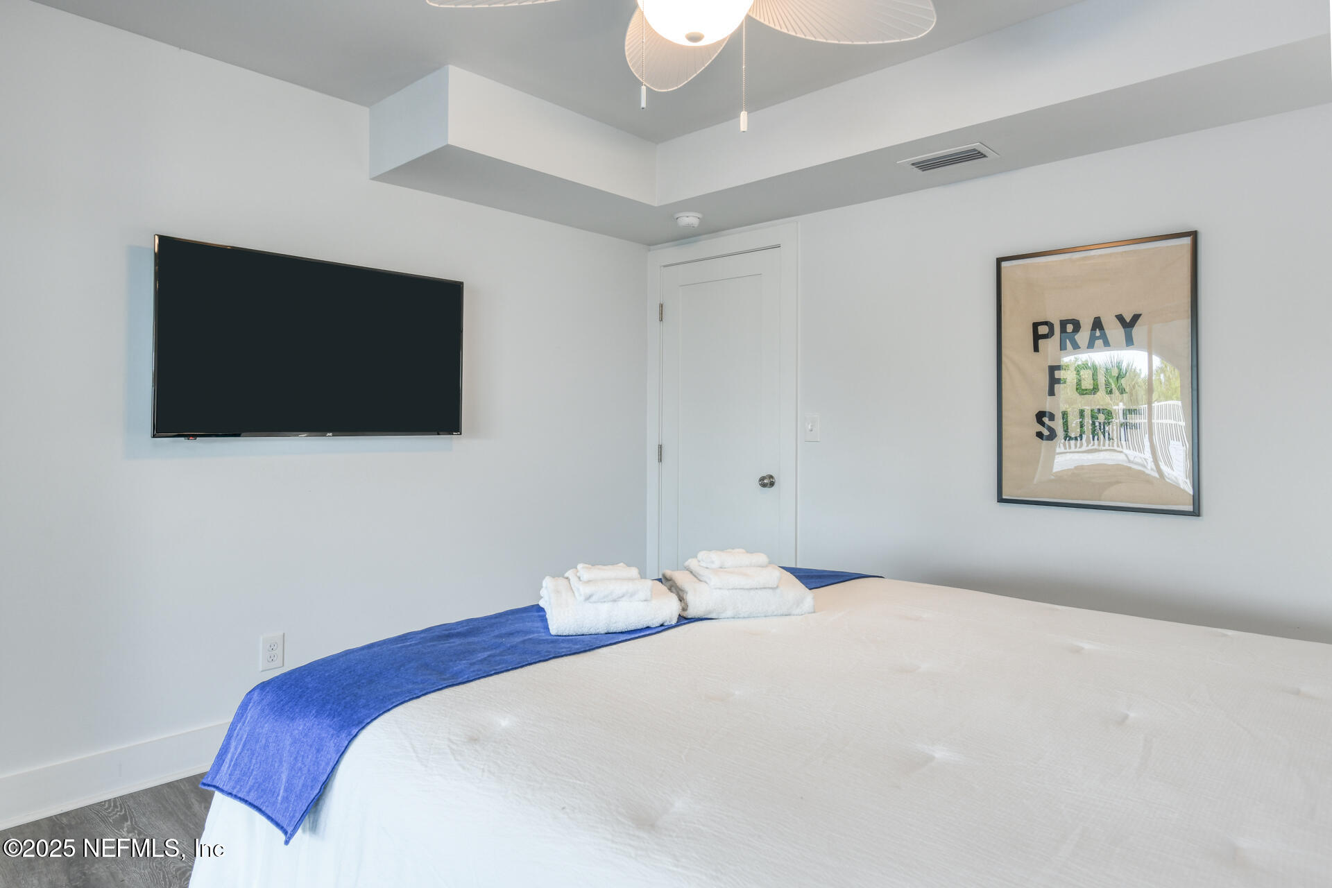 5072 Atlantic View St. Augustine, FL 32080 - Photo 48 of 68 a bedroom with a bed and a flat screen tv