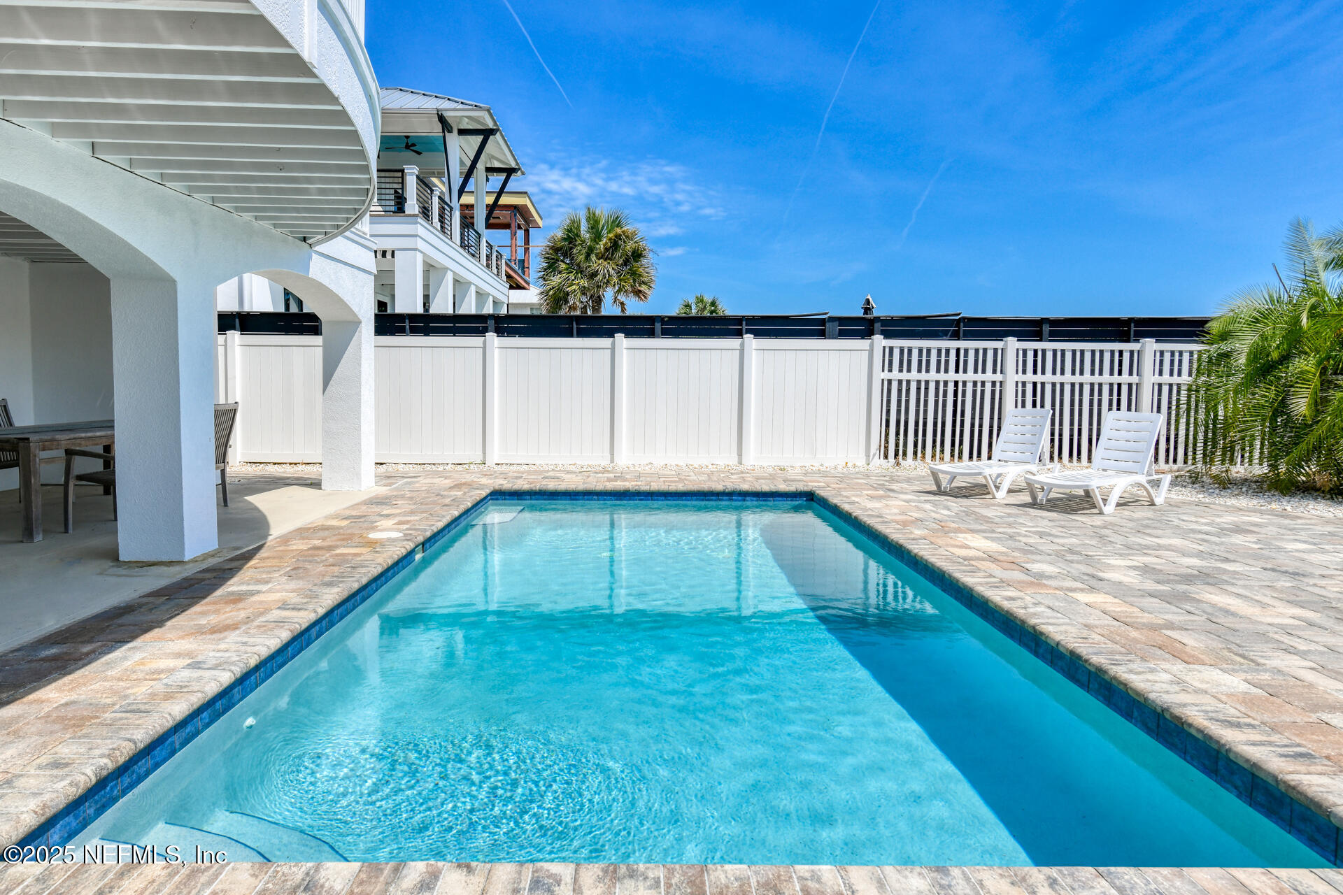 5072 Atlantic View St. Augustine, FL 32080 - Photo 51 of 68 a view of a swimming pool with an outdoor seating
