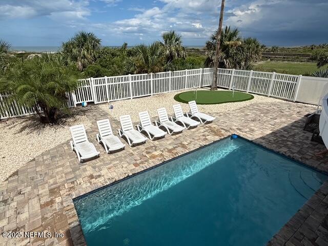 5072 Atlantic View St. Augustine, FL 32080 - Photo 52 of 68 a view of a swimming pool with a patio