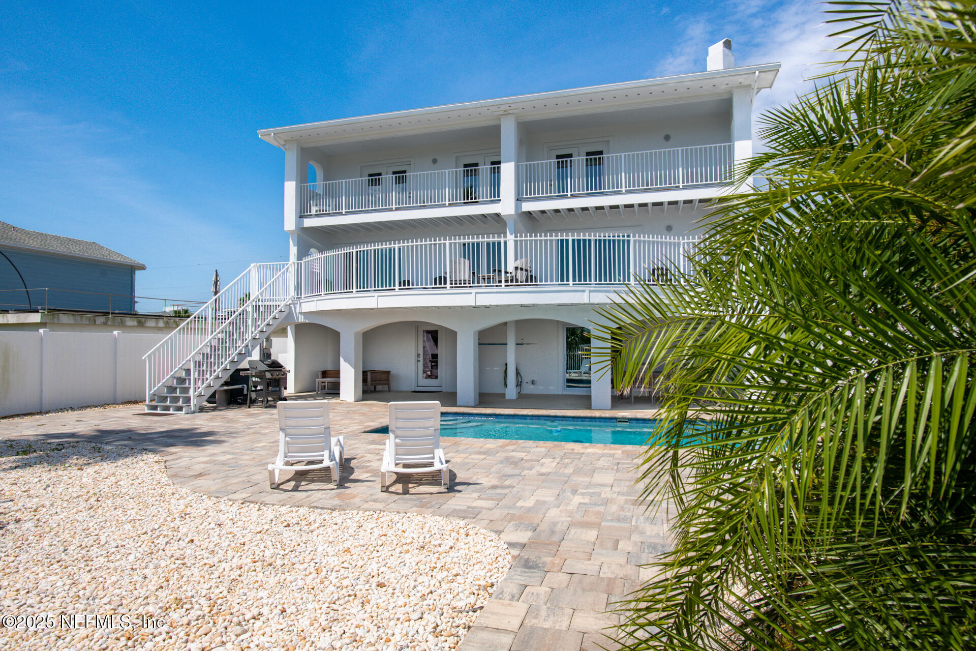 5072 Atlantic View St. Augustine, FL 32080 - Photo 57 of 68 a front view of a house with a yard
