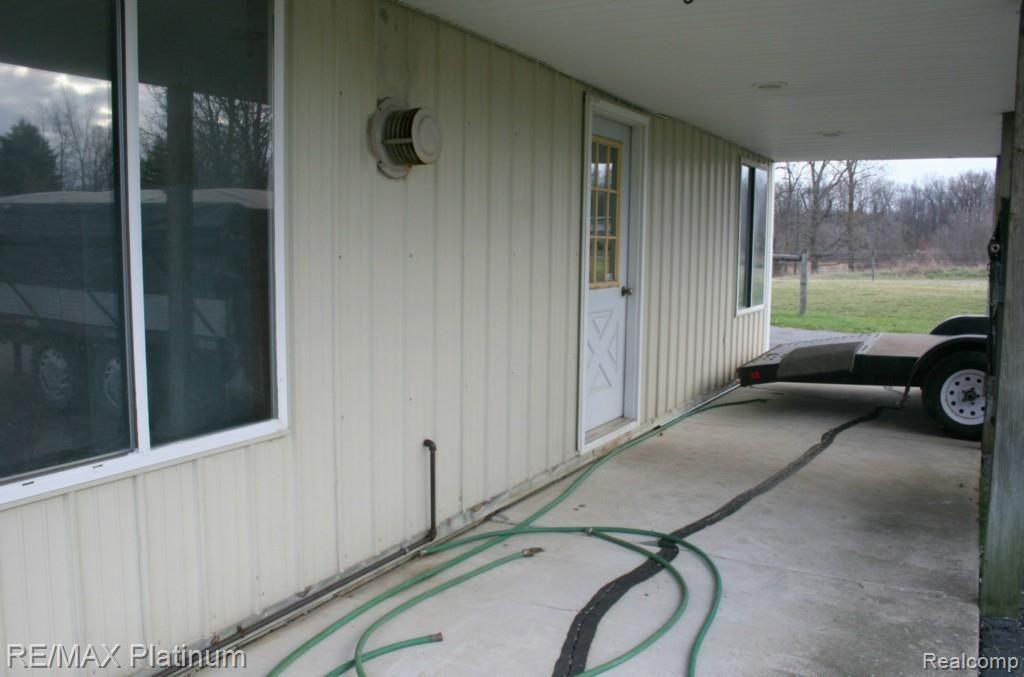 6427 East Clyde Road Howell, MI 48855 - Photo 26 of 34 Covered Porch at Barn