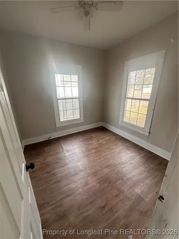 a kitchen with a sink cabinets and window