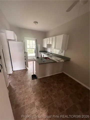 a room with furniture and a window