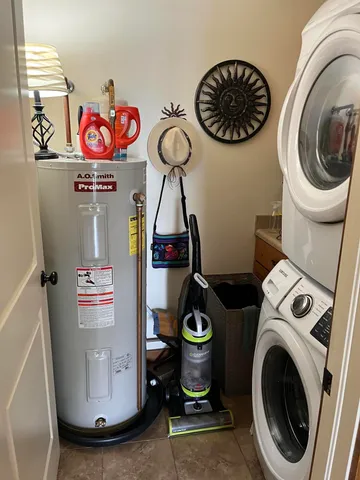 a view of storage and utility area with washer and dryer