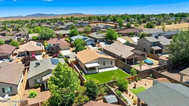 an aerial view of a house with a garden