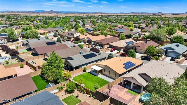 an aerial view of a house with a garden
