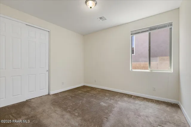 an empty room with a window