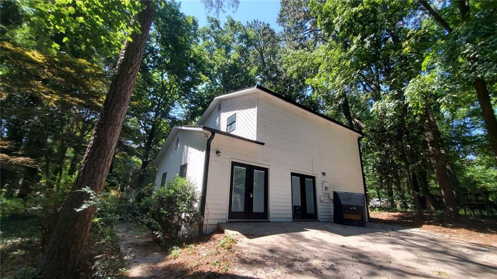 209 Mill Ridge Court Lawrenceville, GA 30046 - Photo 11 of 11 a front view of a house with a yard