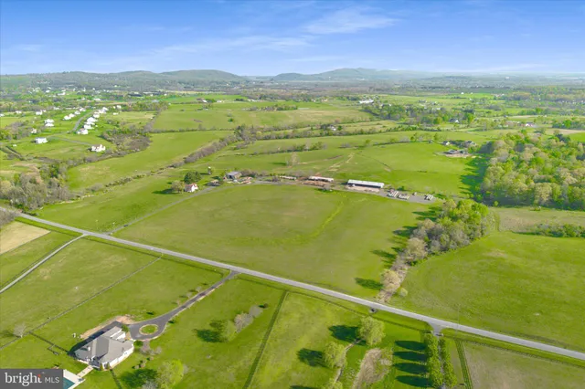 a view of an ocean and a mountain