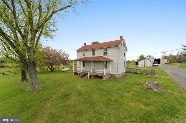 a view of a house with a big yard