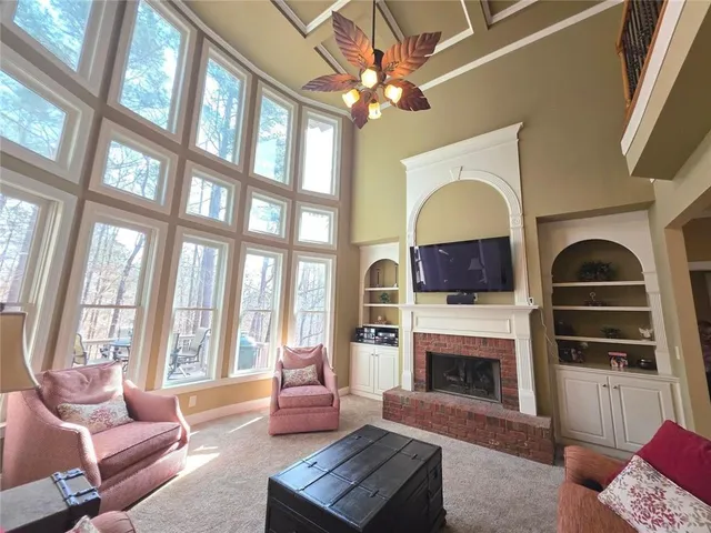 a large kitchen with kitchen island a large island in the center