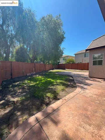 a narrow alley leading to a building