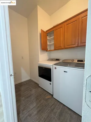 a kitchen with stainless steel appliances a sink and a refrigerator
