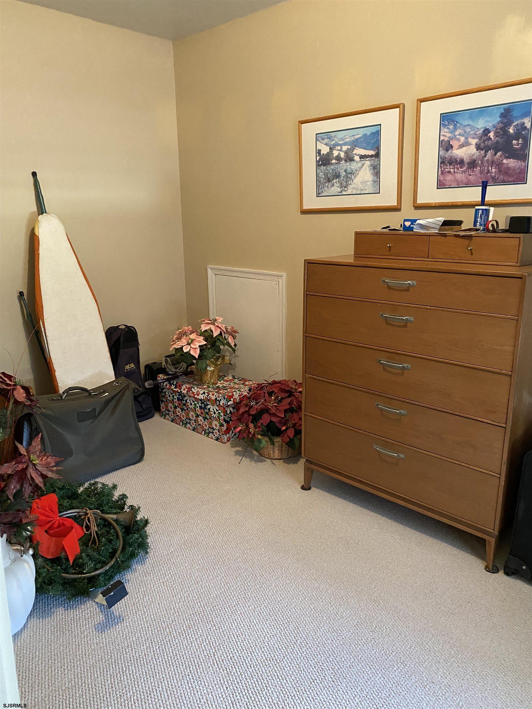 2 Old Mill Drive, Unit 2 Voorhees, NJ 08043 - Photo 17 of 20 a room with toys and dresser