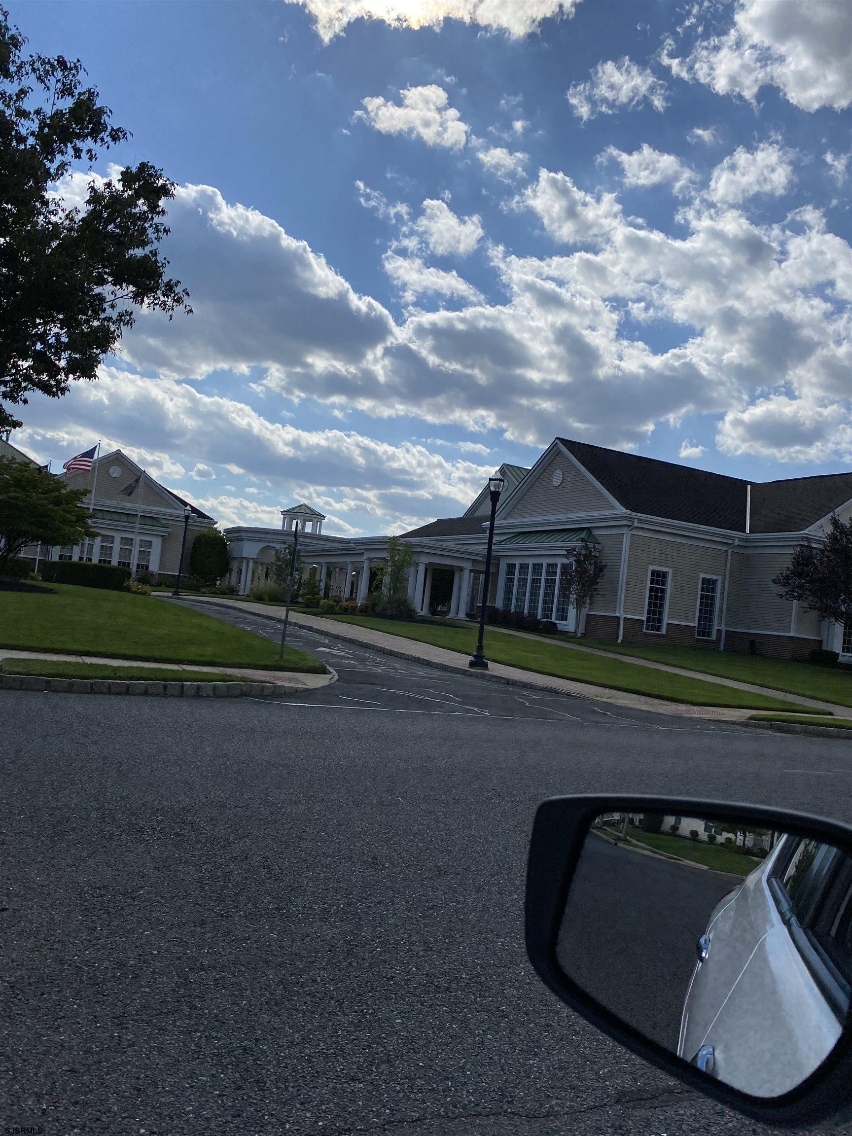 2 Old Mill Drive, Unit 2 Voorhees, NJ 08043 - Photo 18 of 20 a front view of a house with a yard